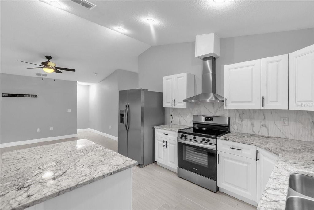 Photo of 319 Avenue A NE, Winter Haven, FL 33881 (MLS # O6397767)