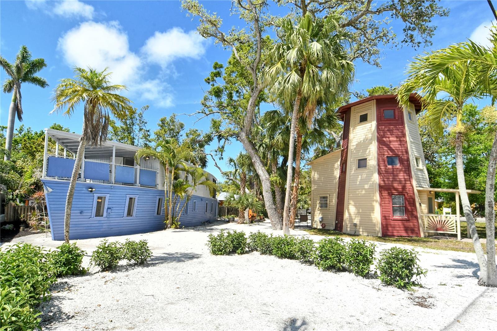 As seen on HGTV August 1, 2025 | HGTV – Zillow Gone Wild
The Boathouse & Lighthouse – A Legacy Property in the Heart of Sarasota
Step into a once-in-a-lifetime opportunity to own two of Sarasota’s most imaginative and historically rich residences—The Boathouse and The Lighthouse—featured on HGTV’s Zillow Gone Wild this August.
Built in 1933 by master boat builder Oliver Blackburn for Arthur Rowe, former yacht captain to John Ringling and William Selby, this property is a rare fusion of artistry, architecture, and legacy. Nestled in the vibrant, walkable neighborhood of Gillespie Park, it offers a lifestyle unlike any other.
The Boathouse: A 2BR/2BA home crafted to resemble a livable vessel on land, featuring sunlit living spaces, a modern kitchen, and a spiral staircase leading to a private owner’s suite with balcony The Lighthouse: A 1BR/1BA vertical residence with three levels, including a top-floor observation room—perfect for a studio, office, or creative retreat. Just 4.2 miles to Lido Beach, you can walk, bike, or drive to the powdery sands and turquoise waters in minutes—bringing the best of Sarasota’s coastal lifestyle right to your doorstep.
Surrounded by lush tropical landscaping and just blocks from downtown Sarasota’s dining, arts, and the waterfront Bay Park, this property is a unique opportunity for:
Investors seeking high-performing, character-rich rentals
Creatives looking for an inspiring live/work environment
History lovers drawn to Sarasota’s storied past
Currently operating as successful short-term rentals, the homes have flexible use potential—live in one, rent the other, or reimagine both as a private compound, boutique retreat, or artistic haven.
This is more than real estate—it’s a storybook legacy waiting to be continued.