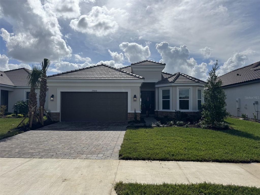 Photo of 29608 Toricelli Road, Wesley Chapel, FL 33543 (MLS # J982908)