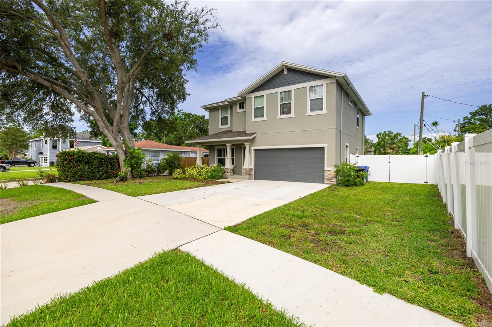 Welcome to this stunning 2023 Domain-built home, located in one of the highest elevations in St. Petersburg and completely outside of a flood zone! This impressive two-story, concrete block construction boasts four spacious bedrooms, two and a half beautifully appointed bathrooms, and a smart, functional layout perfect for modern living. Step inside to discover an open and inviting floor plan featuring a formal living room, family room, dining area, and a sleek, contemporary kitchen—all thoughtfully arranged on the main level along with a convenient half bath. Upstairs, you'll find all four bedrooms, two full bathrooms, and a dedicated laundry area, providing optimal privacy and practicality. The kitchen is a chef’s dream, equipped with cutting-edge smart appliances and designed for both style and efficiency. Additional features include a water softener and reverse osmosis system by One Green Plumbing & Filtration, dual-zone Honeywell A/C systems controlled by app, and a full-yard irrigation system with a Rain Bird sensor to keep your lawn lush and green. The backyard is an entertainer’s paradise! Enjoy a fully fenced, oversized yard complete with a custom paver patio, outdoor grill, built-in mini refrigerator, and plenty of shaded and sunny areas to lounge. The beautifully landscaped yard offers soft grass for pets or children to play and is spacious enough to accommodate a future pool. The neighborhood is as welcoming as the home itself—known for its tight-knit community feel, friendly neighbors, and festive block parties for the 4th of July and Halloween. You’ll see people out walking, biking, and enjoying life in this vibrant, walkable area. Prime central location! You're just minutes from downtown St. Pete, with quick and easy access to I-275, Tampa International and St. Pete–Clearwater airports, world-class beaches, shopping, dining, and everything St. Petersburg has to offer.
This is the one you've been waiting for—modern, move-in ready, no flood insurance required, and packed with smart upgrades. Don’t miss it!