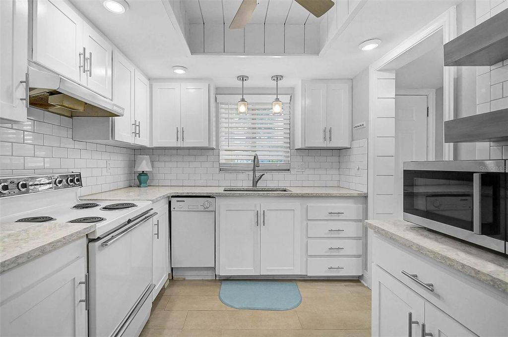 Photo of 3585 Lake Bayshore Drive #J-301, Bradenton, FL 34205 (MLS # A4674487)