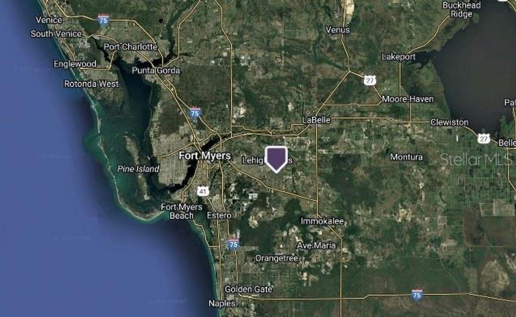 Photo of 357 Nathan Avenue, Lehigh Acres, FL 33974 (MLS # C7506294)