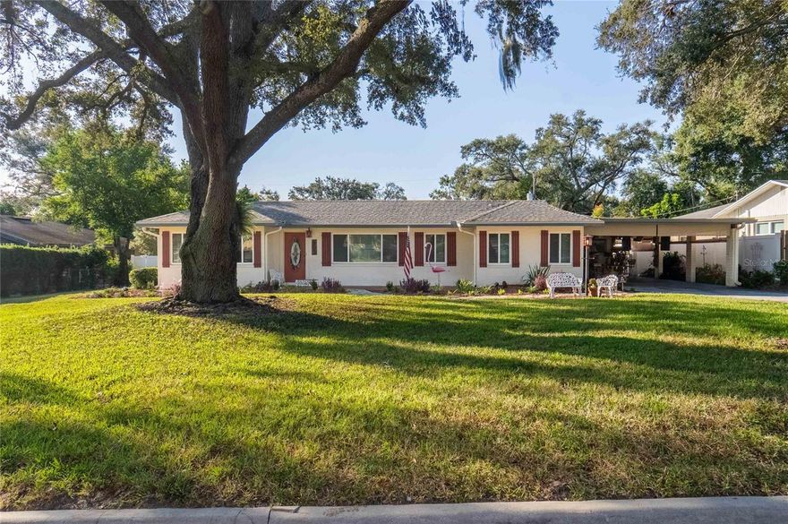 Introducing your dream home in Central Lakeland with no HOA. This spacious 4-bedroom, 3-bathroom gem offers the perfect blend of comfort and versatility. This home offers a newer roof and windows (2021)! As you step inside, you'll be greeted by the charm of an older home and also the excellent craftsmanship from the past. One of the unique features of this home is the versatile mother-in-law suite or a private space for older children. This separate area provides both privacy and convenience for your family's needs.
You will also discover a well-designed split plan that ensures peace and privacy for all. The master bedroom is a true retreat, tucked away from the hustle and bustle of daily life. The kitchen has a eat in space as well as an additional dining space in the open living, dining and den area. Outside, a serene and private sitting area awaits you, offering the ideal spot to relax and unwind. Beyond, the sitting area in the spacious fenced backyard sits a well equipped and maintained above-ground pool, perfect for hours of fun and entertainment.
The carport doubles as a covered sitting area, offering a delightful space for outdoor gatherings.
This charming property is situated on an adorable brick-paved street and boasts a large lot with plenty of space for your family's activities.
With its convenient location, you're just a stone's throw away from shopping, parks, and restaurants. The proximity to the Polk Parkway and Lake Hollingsworth further enhances the appeal of this wonderful family home. Don't miss the opportunity to make this delightful property yours today!