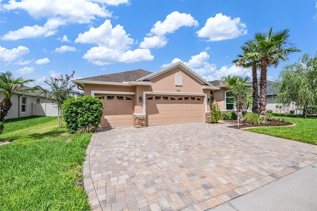 Photo of 27205 Hawks Nest Circle, Wesley Chapel, FL 33544 (MLS # TB8512012)