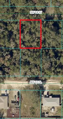 Very nice vacant lot in Ocala Ridge to build your dream house . Close to shops , WEC , restaurants and more