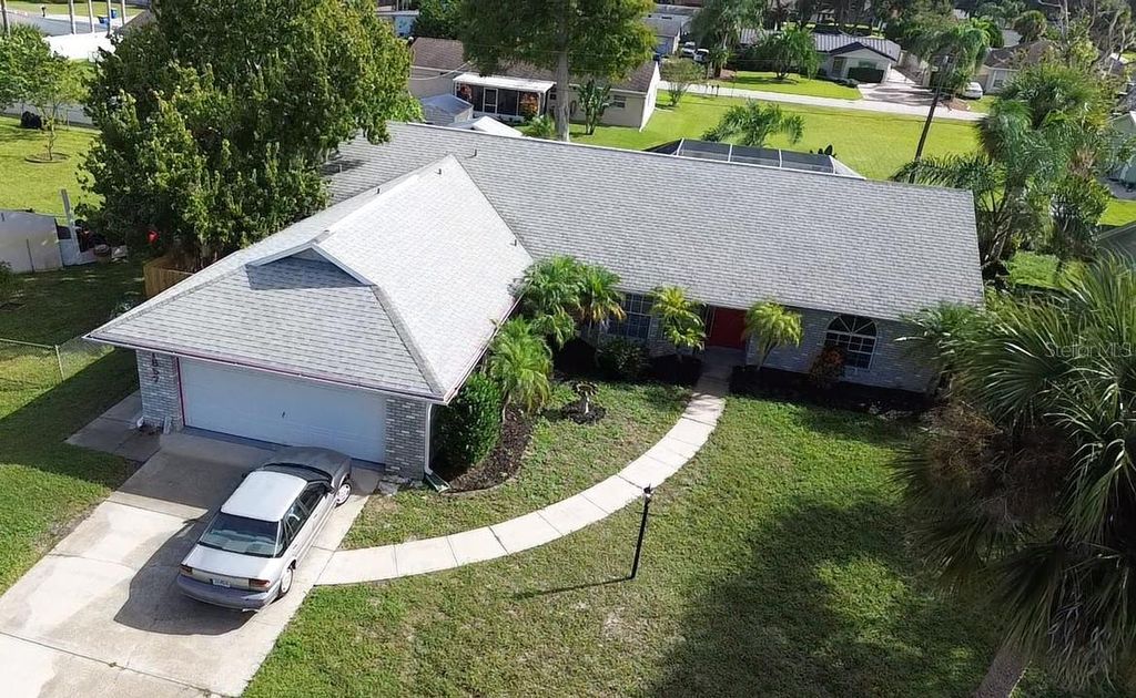 Photo of 1857 Travelers Palm Drive, Edgewater, FL 32141 (MLS # NS1086176)