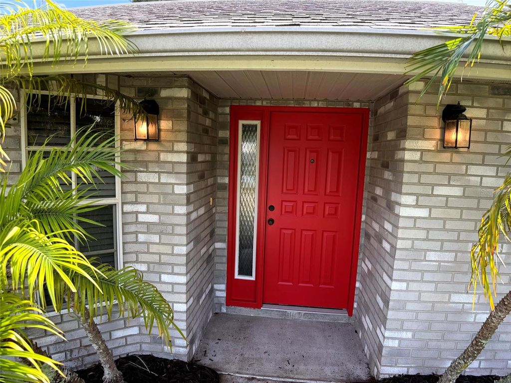 Photo of 1857 Travelers Palm Drive, Edgewater, FL 32141 (MLS # NS1086176)