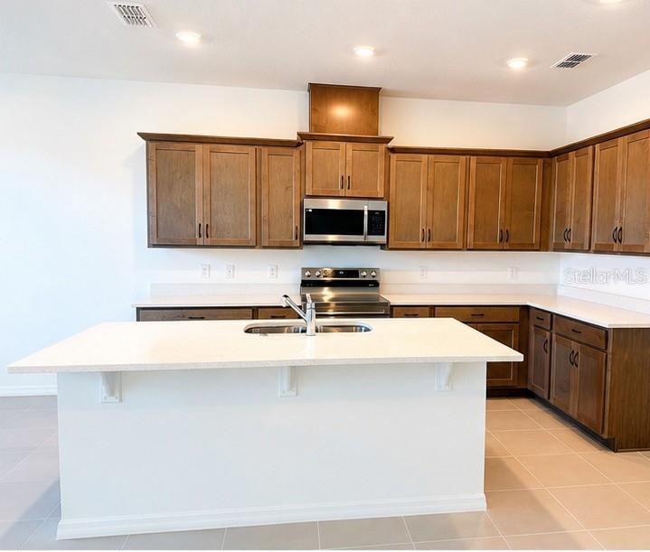 Photo of 333 Marion Loop, Haines City, FL 33844 (MLS # O6428266)