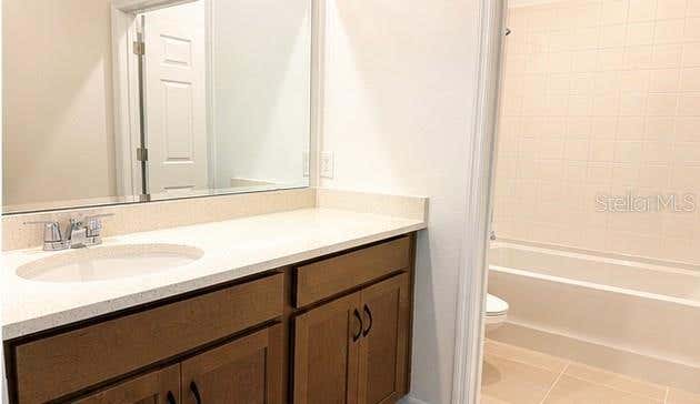 Photo of 333 Marion Loop, Haines City, FL 33844 (MLS # O6428266)