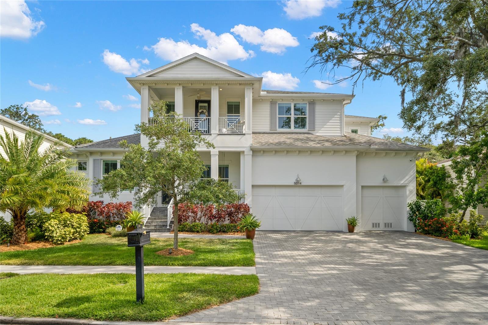 Built in 2019, this New Legacy home exudes timeless elegance with a warm and inviting feel throughout. The first floor includes a spacious master suite overlooking the very private backyard and pool area with plenty of room to lounge in the sun. The family room w/ 21'ceilings and custom designed fireplace is the perfect place to entertain family and friends. There are French doors leading out to the covered lanai and pool area. The chef's kitchen overlooks the family room and informal dining area and boasts an expansive center island, quartz countertops, Fisher & Paykel gas appliances along w/ a double drawer dishwasher, soft close custom cabinets w/ LED under counter lighting and a pot filler. The formal dining room is perfect for intimate or large gatherings. There is also a private office off the entry and a guest bedroom w/ a pool bath. The downstairs also features a half bath and a laundry room with a dog wash station and mudroom that leads out to the 3 car garage. On the second floor you will find an incredible media room w/ theatre seating and a bar plus a door that leads out to a balcony. Additionally, there are 3 bedrooms w/ walk in closets and 2 full bathrooms. Other features include: plantation shutters, wood plank tile, custom moldings, Elan Home Automation system, remote video doorbell, 8' interior doors, Impact windows, custom cabinetry, in wall pest tubes, Icynene spray foam insulation, 18 Seer HVAC w/multi zones, low voltage exterior lighting. The backyard is a tropical paradise w/ a heated pool and spa, green space, a built-in gas grill under the covered lanai and access to the pool bath. Enjoy Florida living at its best!