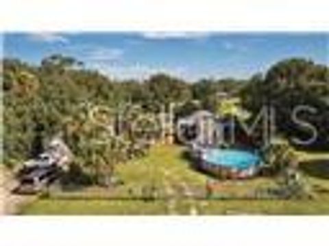 Photo of 1106 Charles Street, Moore Haven, FL 33471 (MLS # A4667967)