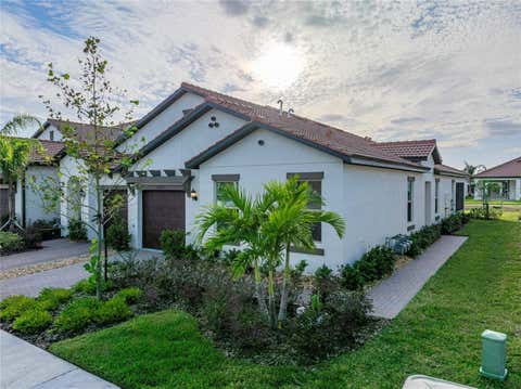Photo of 17319 Holly Well Avenue, Wimauma, FL 33598 (MLS # TB8537095)