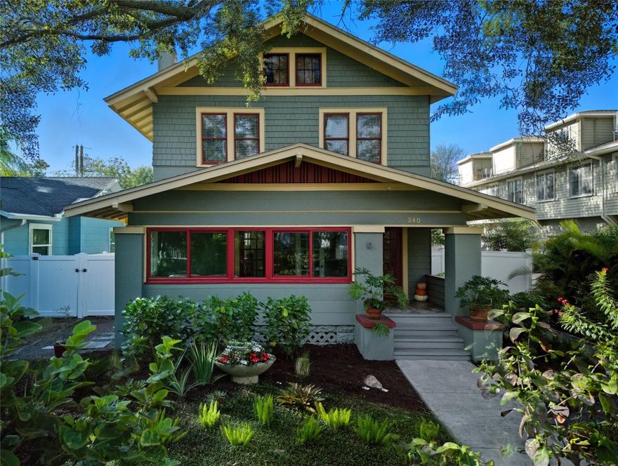High & Dry in Flood Zone X with NO storm damage, this home offers the peace of mind and charm you’ve been looking for.  Stroll to your favorite coffee shops, catch a show at the Palladium, or enjoy a walk along the Bay—all just minutes away!  This 3-bedroom, 2.5-bath residence with a one-car garage blends timeless 1920s craftsmanship with thoughtful modern updates. The property is also approved for an auxiliary dwelling unit (ADU), offering fantastic potential for future expansion.  Step through classic French doors into the spacious enclosed front porch, featuring new windows that flood the room with natural light—an inviting retreat for morning coffee, evening cocktails, or casual gatherings. Inside, the main floor exudes warmth and character with a brick fireplace centerpiece, elegant built-ins, picture-frame crown molding, and a custom dining room bar. Additional highlights include a charming breakfast nook, oversized walk-in pantry, and convenient half bath.  Upstairs, discover two generously sized guest rooms and a versatile office/bonus room—once known as the sleeping porch—overlooking the lush backyard. The primary suite impresses with an ensuite bath and his-and-her closets, offering comfort and privacy.  Outdoors, enjoy your private backyard oasis, perfect for al fresco dining, entertaining, or simply relaxing in the Florida sunshine. The lot has plenty of room for a pool if you so desire as well.  Beyond the privacy fence, an oversized parking pad accommodates two vehicles, a boat, or an RV. The garage is fully wired for electricity and outfitted with a window unit—ideal for a workshop or creative studio.  Roof (2017) Primary ensuite renovation (2019) Front porch enclosure (2024)  HVAC (2007) Tankless Water heater (2008) Whole-house water purifying system, wifi controlled Irrigation system.