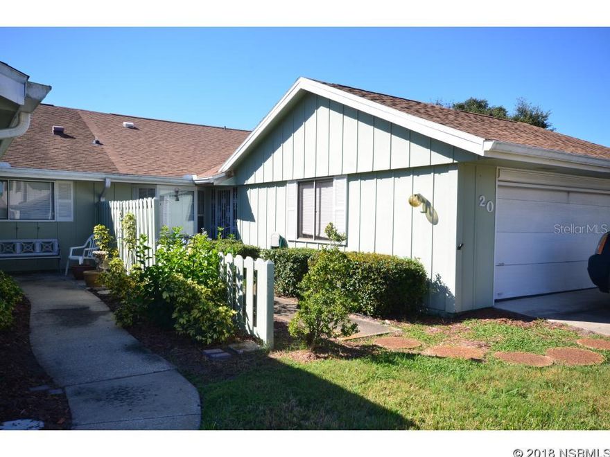 Centrally located golf villa with spacious open floor plan.  Home offers large kitchen with bay window and pantry, tile in entry and kitchen, large great room that overlooks air conditioned florida room.  Both bedrooms offer ample space and storage.  Roof was replaced in 2015.  Appliances include washer/dryer, dishwasher, refrigerator, and microwave.  Nestled between 2 golf courses, heated community pool available by optional membership. Low annual HOA dues provide sprinkler system maintenance and operation and water to it, subterranean treat & repair termite bond. ;Water: City