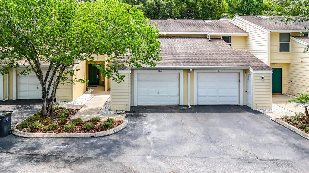 Photo of 11237 Cedar Hollow Lane, Tampa, FL 33618 (MLS # TB8548906)