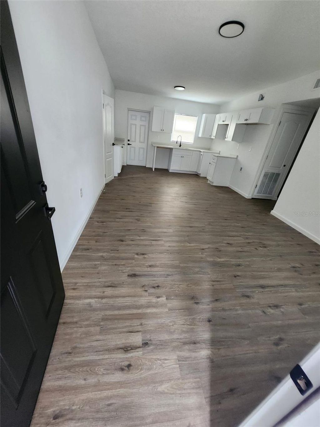 Photo of 1216 Emeralda Road, Orlando, FL 32808 (MLS # S5146326)