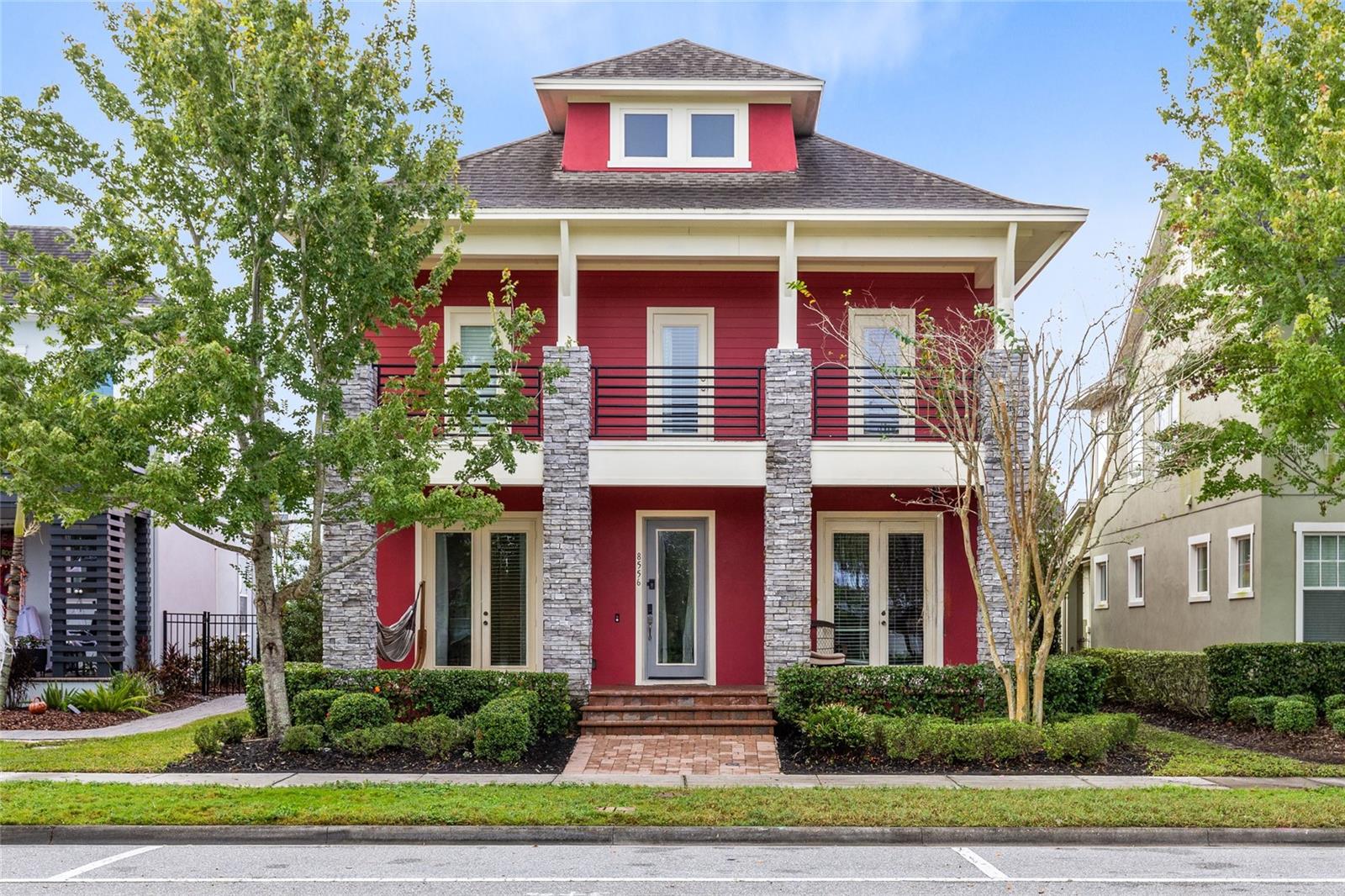 Investors Dream!  Located in the heart of the community in the highly sought-after community of Laureate Park. Built by renowned builder David Weekley Homes, this stunning Southhaven model offers over 3,100 square feet of thoughtfully designed living space that perfectly blends modern comfort with timeless charm.
Featuring five bedrooms and four full baths, this home provides flexibility and function for families of all sizes. From the moment you arrive, the inviting Craftsman-style façade, meticulous landscaping, and covered front porch with a second-floor balcony set the tone for the beauty that continues inside.
Step through the front door to find tile flooring throughout the main living areas, high ceilings, and abundant natural light streaming through large windows. The versatile front room can serve as a formal living space or home office, while the open-concept layout connects the kitchen, dining, and family rooms—ideal for everyday living or entertaining guests.
The chef’s kitchen features rich mocha cabinetry extending into the dining area, a large center island with breakfast seating, and elegant pendant lighting. From here, step outside to the covered porch and fenced grass area, creating a seamless indoor-outdoor flow.
Upstairs, the wood-tread staircase leads to four spacious bedrooms, including the owner’s suite with a private balcony, walk-in closets, and a luxurious en suite bath with dual sinks, granite countertops, a garden tub, and a separate shower. Three additional bedrooms, two full bathrooms, and a media room complete the second floor, offering space for everyone to unwind.
Outdoor living shines with a covered rear porch and open yard—perfect for weekend barbecues or quiet evenings under the stars. The detached three-car garage includes a one-bedroom apartment above, offering potential rental income, a private guest suite, or a dedicated workspace.
Located just steps from the Laureate Park Aquatic Center, residents also enjoy access to LP Fit, dog parks, and neighborhood restaurants. With 44+ miles of scenic trails, proximity to Lake Nona Medical City, and easy access to shopping, dining, entertainment, and major highways, this home truly embodies convenience and luxury living.  
Tenant in place in home until July 2028, Garage rented until 2026!