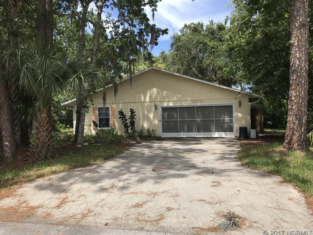 THE BEST DEAL IN FLORIDA SHORESEnjoy the large lot and huge square footage of this amazing home. The beautifully wooded lot and adjacent vacant properties make this home feel like you are on acreage and very secluded. The 3 large bedrooms, oversized baths, and vaulted ceilings with skylights make this a great opportunity. Bring the family, toys, and pets and make this charmer all your own. Pick your paint and flooring and then relax and sit by the fire or lounge on your private screened porch. ;Water: City