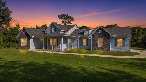 Photo of 26644 Easy Street, Wesley Chapel, FL 33544 (MLS # TB8518536)