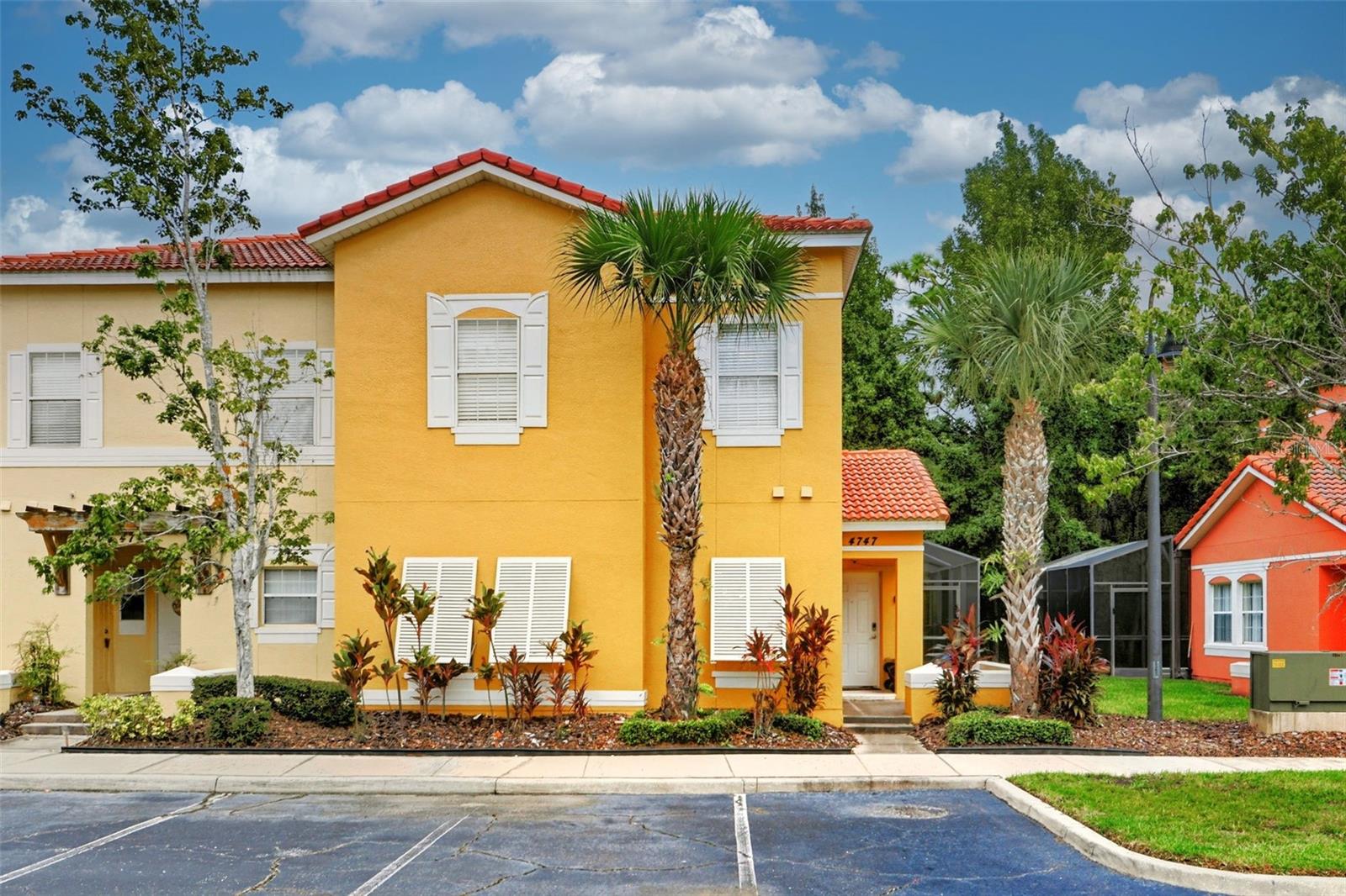 Turnkey Investment or Vacation Retreat at Terra Verde Resort! This FULLY FURNISHED 4-bedroom, 3-bath end-unit home offers extra privacy and a perfect blend of comfort and luxury. Inside, you’ll find a bright open-concept floor plan with a modern kitchen featuring granite countertops, stainless steel appliances, and a spacious island/breakfast bar that flows seamlessly into the dining and family rooms—ideal for hosting guests. The main floor includes a convenient guest bedroom and full bath, while the upstairs offers three additional bedrooms, including a relaxing primary suite. Step outside to your PRIVATE SCREENED POOL and covered lanai, overlooking a peaceful greenery—perfect for enjoying the Florida sunshine or unwinding after a day at the parks. Located within the GATED, resort-style community of Terra Verde, owners and guests have access to an array of amenities: a grand clubhouse with fitness center, heated resort pool with tiki bar, playground, tennis, basketball, and volleyball courts, plus a fishing lake, walking trails, and more! Just minutes from Disney, Universal, shopping, dining, golf, and Orlando International Airport, this home is ideally positioned for use as a short-term rental, vacation getaway, or investment! A true turnkey opportunity—schedule your private tour today!