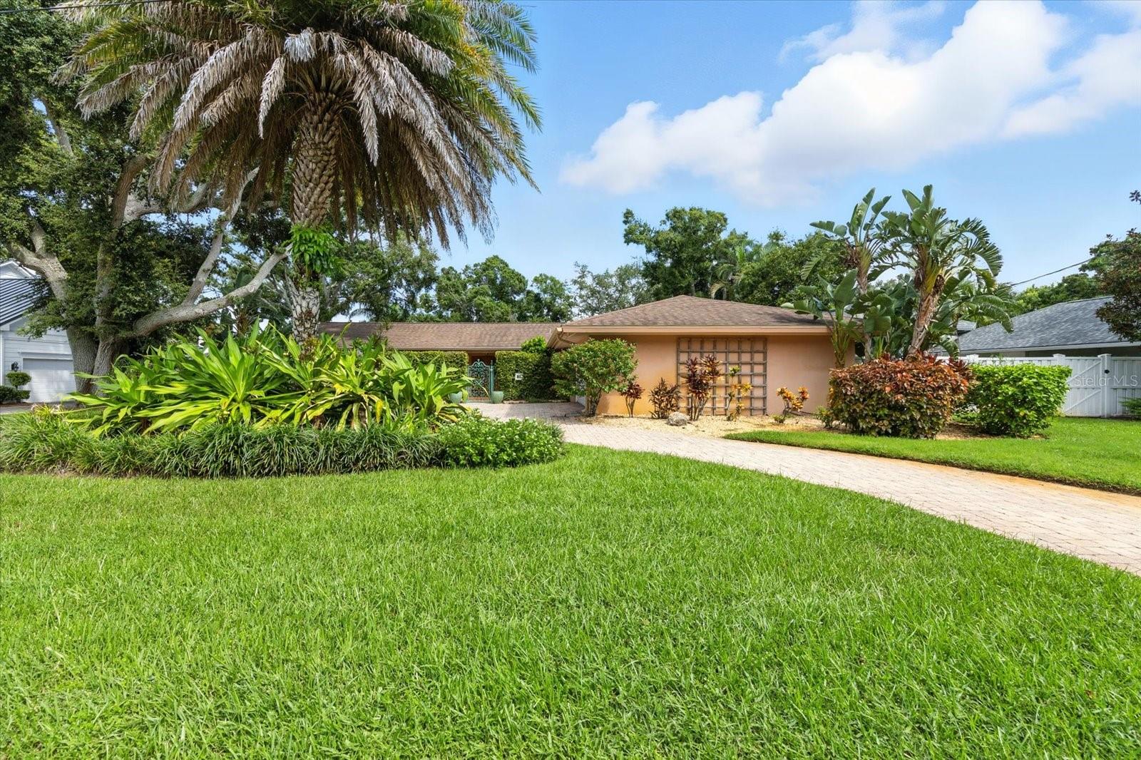 Spacious 3-bedroom, 3-bath pool home in the heart of Belleair! Just two blocks from the open bay, you’ll enjoy living close to the water with beautiful views, all while being high and dry in Flood Zone X and a non-evacuation zone.
Inside, the split floor plan offers an interior laundry room, a two-car garage, and plenty of opportunity to make the space your own. Step outside and experience true Florida living with a built-in grill, screened solar-heated pool, and mature tropical landscaping — an ideal setting for entertaining or relaxing.
Recent updates include a new AC unit and water heater (2023), plus a natural gas water heater, stove, and dryer for efficiency and comfort. A full-home generator adds year-round peace of mind.
Living in Belleair means more than just a beautiful home. The community is known for its tree-lined streets, historic charm, and welcoming atmosphere. You’ll be just blocks from the prestigious Pelican Golf Club and close to the historic Belleair Country Club. Outdoor enthusiasts enjoy the nearby Pinellas Trail and waterfront parks, while award-winning Gulf beaches, boutique shopping, and local dining favorites are only minutes away. Clearwater and St. Petersburg bring arts, sports, and nightlife within easy reach, and Tampa International Airport is just 30 minutes away.
This is a rare opportunity to create your dream home in one of Belleair’s most desirable neighborhoods.