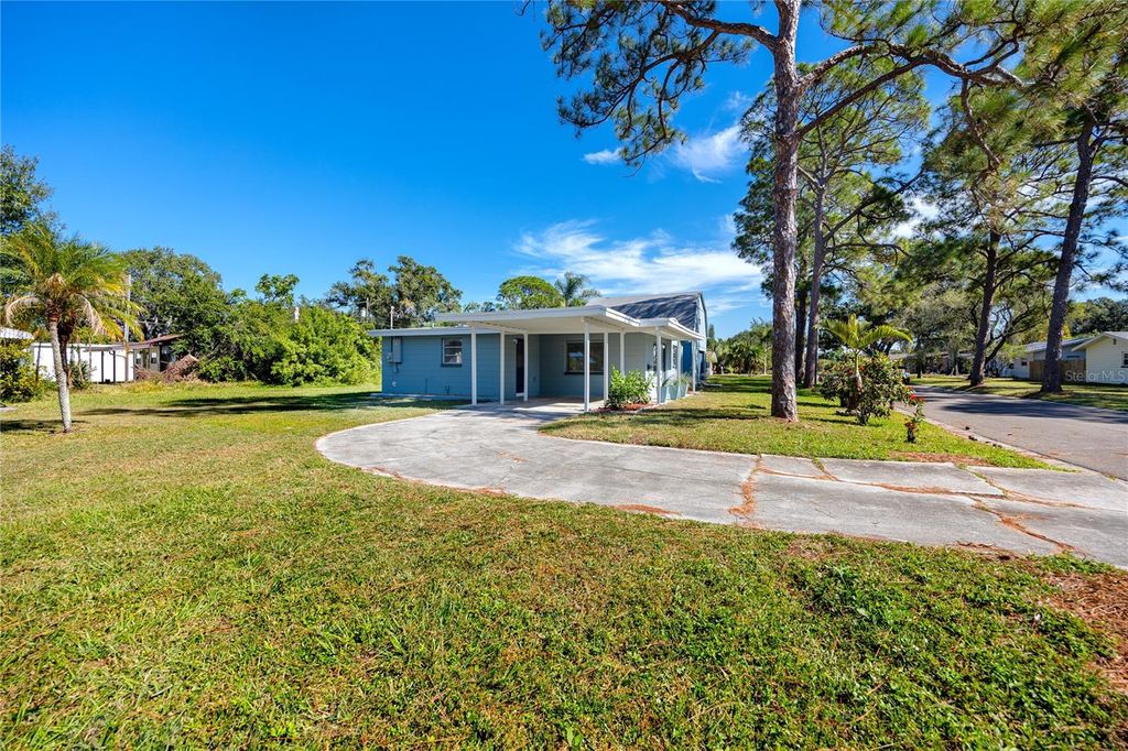 Photo of 647 Garland Street N, St Petersburg, FL 33703 (MLS # TB8445431)