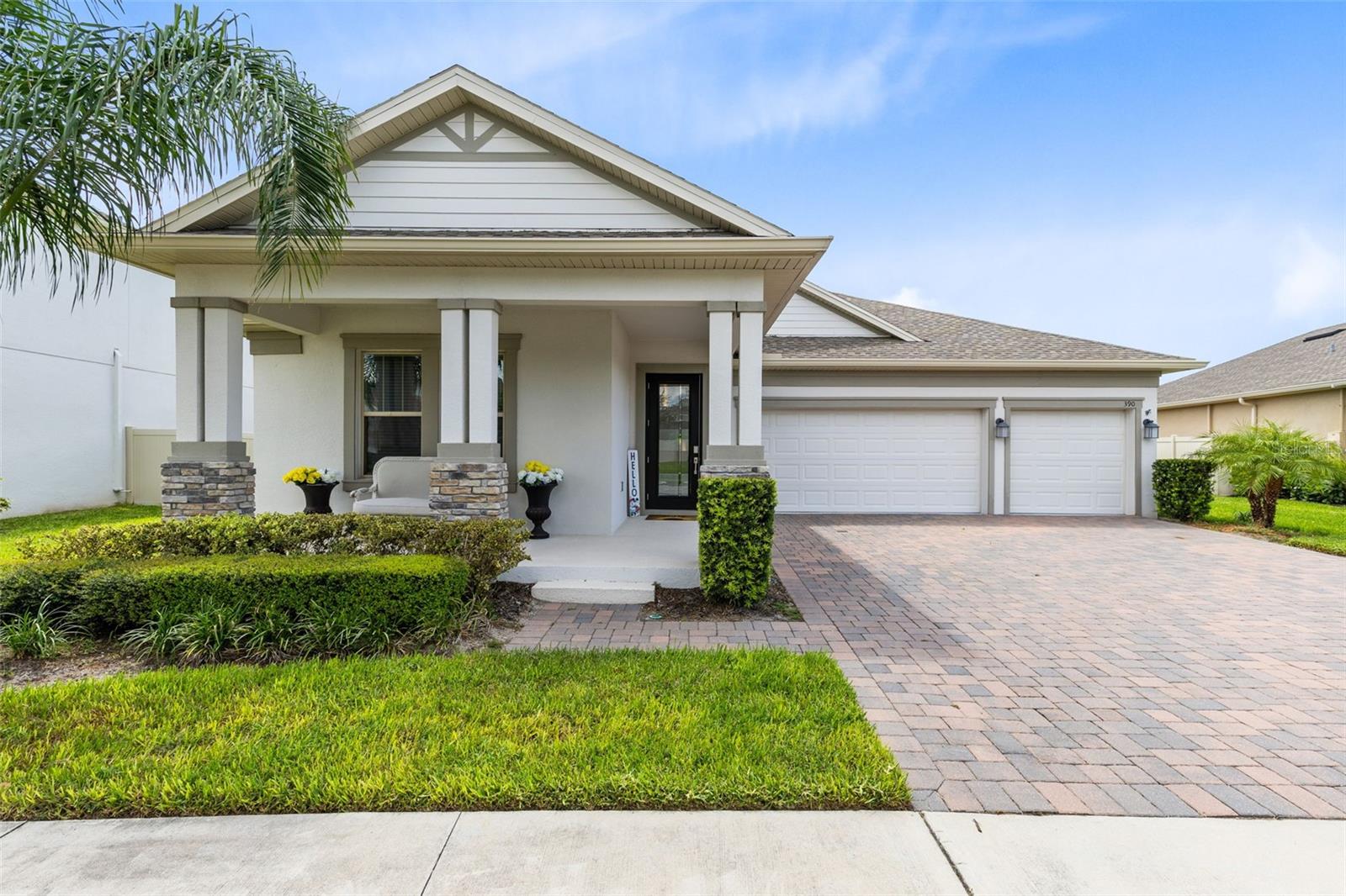 Welcome to 390 Singing Tree Lane, the crown jewel of Tuskawilla Crossings! This stunning 4-bedroom, 3-bathroom pool home offers over 2,600 square feet of stylish living space, BUILT IN 2021 with a modern open-concept layout, split floor plan, and tile flooring throughout the main areas. The chef’s kitchen boasts quartz countertops, stainless steel appliances, and plenty of space for entertaining, while the spacious master suite is tucked privately in the back of the home with serene views of the backyard oasis. Step outside to your personal paradise featuring a designer, SALT WATER, HEATED POOL with sun shelf, jacuzzi, gazebo, and brick paver deck, all overlooked by a gorgeous lanai and complemented by an extended front porch with sitting area. A 3-CAR GARAGE provides ample space, and the home is powered by solar panels to keep energy costs low. Best of all, it’s the ONLY pool home currently for sale in the community! Located in one of Winter Springs’ most sought-after neighborhoods, residents enjoy access to top-rated schools including Layer Elementary, and walking distance to Indian Trails Middle and Winter Springs High. Just down the road you’ll find Central Winds Park with pickleball, dog parks, playgrounds, sports fields, and year-round events, plus nearby Winter Springs Village offers restaurants, groceries, Starbucks, gyms, and entertainment. With easy access to the 417, you're only 25 minutes from Downtown Orlando, 35 minutes to OIA, and 45 minutes to the beach—this one truly has it all!