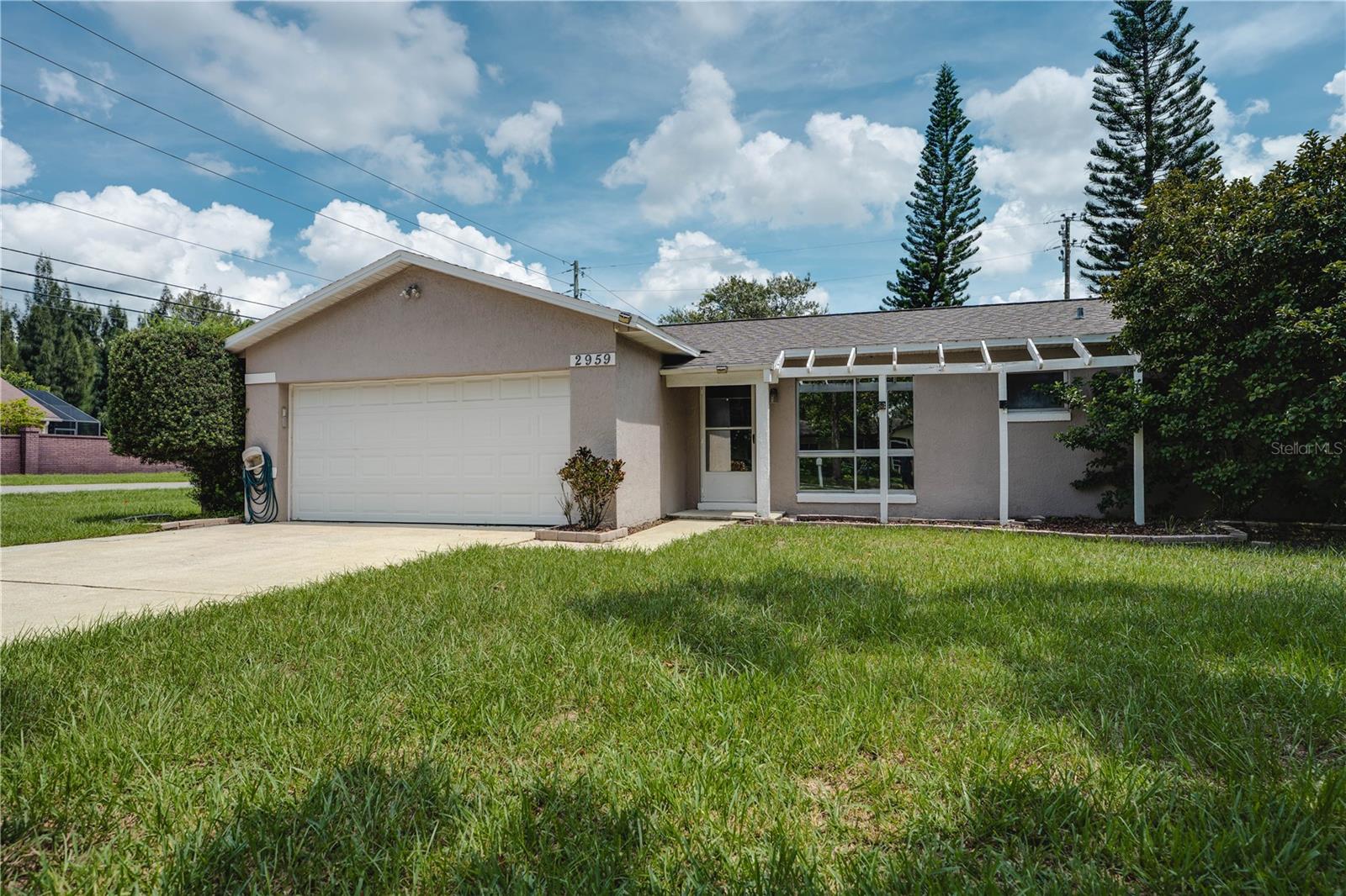 Charming 3 Bedroom + Den Home with Pool No HOA and super LOW Property Taxes! Welcome to this move-in ready 3 Bedroom, 2 bath home with an additional den, perfectly located near Dean Road, University Blvd, UCF, and easy access to the 417. Whether you’re looking for a great starter home or a smart alternative to student housing, this property checks all the boxes. Step inside to find travertine tile floors, a modern kitchen with white cabinets, granite countertops, and stainless steel appliances, and a spacious open layout that’s perfect for everyday living. The primary suite and additional bedrooms are well sized, while the versatile den can be used as a home office, study space, or guest room. Enjoy your large backyard complete with a small in ground pool, and Deck ideal for Florida living and entertaining. Completely Fenced Backyard for privacy and a charming storage shed. Enjoy afternoons on the covered screen porch. This is your chance to own a home in the most desired area with NO HOA. Roof replaced in 2021 and no HOA restrictions, you’ll have peace of mind and freedom to make this home your own. Conveniently close to shopping, dining, schools, and UCF, this property offers incredible value and location!