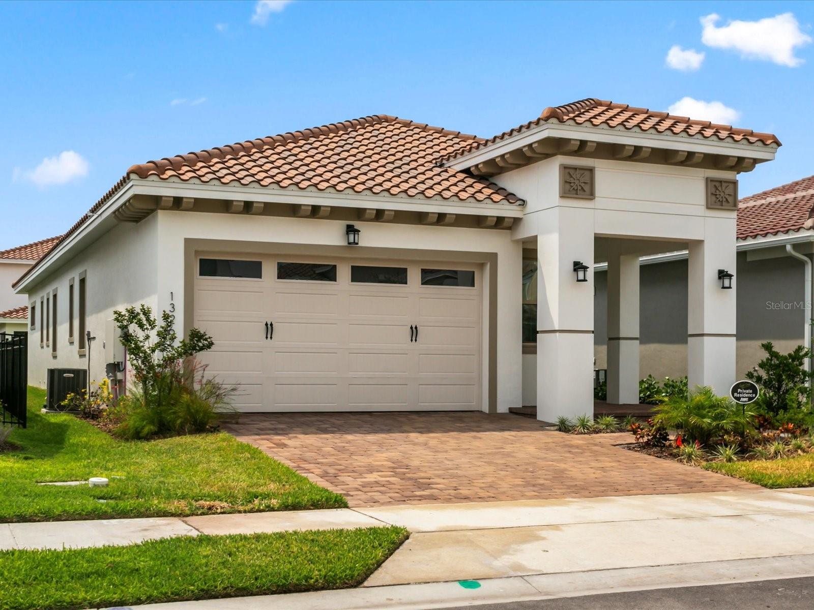 Welcome to your dream home in the heart of Lake Nona's desirable Eagle Creek Country Club Community! This newly constructed single-story masterpiece, completed in October 2023, epitomizes modern elegance and offers an unparalleled living experience. As you step inside, you're greeted by an open and airy floor plan adorned with high-end finishes and meticulous attention to detail. The expansive living area is perfect for entertaining guests or unwinding with loved ones. The gourmet kitchen boasts sleek quartz countertops, Samsung stainless steel appliances, ample cabinet space, and a convenient island, making it a chef's delight. The adjacent dining area offers a cozy space for enjoying meals together. The luxurious master suite is a retreat unto itself, featuring a generously sized bedroom, a spa-like ensuite bathroom with dual vanities, a rainfall shower, and a walk-in closet. Two additional bedrooms provide versatility and comfort for family members or guests. Step outside to your private outdoor sanctuary, where you'll find a covered patio ideal for al fresco dining or simply basking in the Florida sunshine, with hookups for a summer kitchen already installed. The professionally landscaped yard offers lush greenery and plenty of space for outdoor activities or gardening. Conveniently situated near Lake Nona Medical City, residents enjoy easy access to world-class healthcare facilities and research institutes. This vibrant community is also home to A-rated schools, upscale shops, delectable dining options, and entertainment venues. Plus, being in close proximity to the Orlando International Airport ensures hassle-free travel. Nearby Boxie Park offers endless opportunities for outdoor recreation and family fun. Residents of Eagle Creek Country Club enjoy access to an array of resort-style amenities, including a recreational clubhouse perfect for hosting events and gatherings. Stay active and fit at the state-of-the-art fitness center or tee off at the premier golf course, complete with a renowned restaurant for post-game dining. Cool off on hot summer days at one of three sparkling community pool or challenge friends to a game of tennis or basketball on the courts. Experience the epitome of luxury living in Lake Nona's Eagle Creek Country Club Community. This exceptional home offers the perfect blend of comfort, convenience, and sophistication. Schedule your private tour today and make your dream home a reality!
