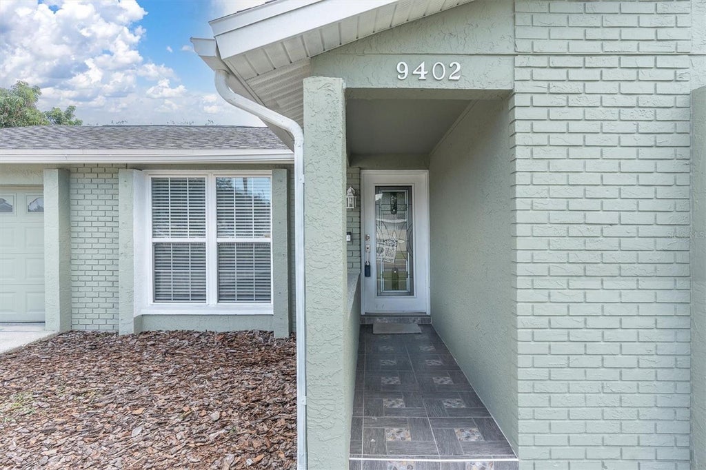 Photo of 9402 Attenbury Drive, Tampa, FL 33615 (MLS # TB8558279)