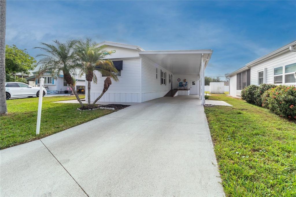 Photo of 214 Leisure Way, Palmetto, FL 34221 (MLS # A4674215)