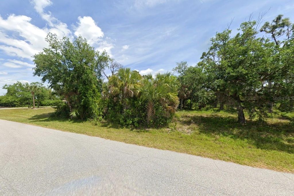 Photo of 3528 Dwight Street, Port Charlotte, FL 33981 (MLS # W7872857)