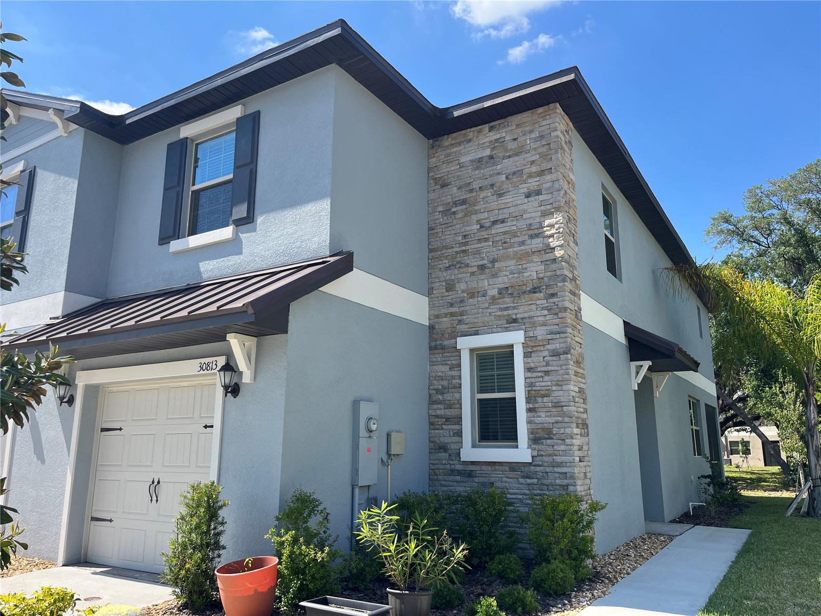 Check out this 3 Bedroom End Unit Townhome currently available for Rent. This two-story townhome has an amazing contemporary open design among the first-floor kitchen, living room and dining room. Upstairs caters to intimate spaces with a versatile loft area, the comfortable owner’s suite and two bedrooms with a Jack-and-Jill style bathroom. The community offers peaceful, family-friendly living in an area filled with top-rated schools, local shops and restaurants. With close proximity to State Road 56 and I-75, residents are only 25 miles from Downtown Tampa. Be the first to enjoy this townhome rental and call it home! Pet Friendly, call today to schedule your showing. Equal Housing Opportunity.