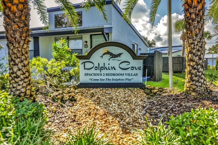 Boating enthusiasts, this is the get away you have been waiting for!!  Large 2 bedroom 2 bath Condo at the exclusive Dolphin Cove on the north causeway in New Smyrna Beach. This condo is being sold with 3 boat slips .  No more battling the boat ramp on the weekends.  Located  just 1 mile to the Famous Flagler Ave and some of NSB's best attractions.  Beautiful paddle boarding and kayaking on the backwaters behind Quay Assisi and Marine Discovery Center.  This Trendy condo is being SOLD fully furnished, as shown including washer and dryer.  Updated Marble countertops throughout and stainless appliances in the kitchen.  You will love how bright and open your new condos is.  Plenty of space for guests.  Sleeps 6 comfortably.  Grilling and chilling outside on your back porch make entertaining a breeze.  Easy to rent with strong rental history and future bookings, which could help pay for itself.  You will love having your boat on the water, even when you have renters. This Waterfront community has a fishing area, gazebo for group outdoor gatherings, and privately owned boat slips on the boardwalk on the river. Close to downtown historic district, walk to the farmers market, restaurants, and/or golf cart ride to cafes and coffee shops.  Isn't it time you start "Living the Dream" in NSB ;LocationDescription: Condo ;Water: City