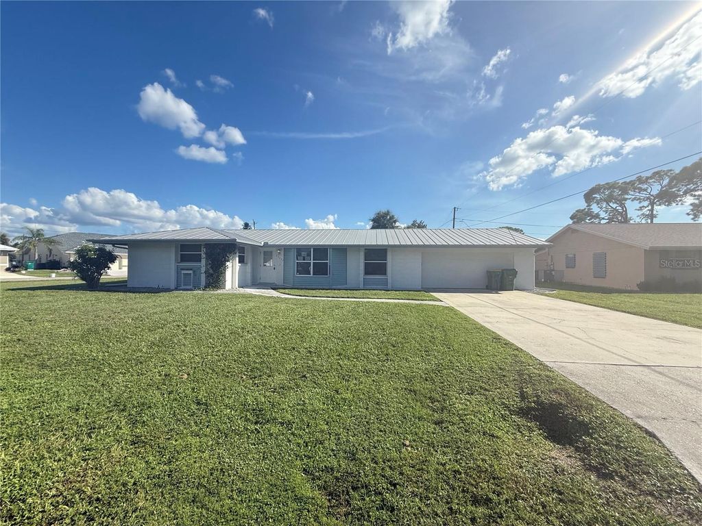 Photo of 22237 Lockport Avenue, Port Charlotte, FL 33952 (MLS # TB8429774)
