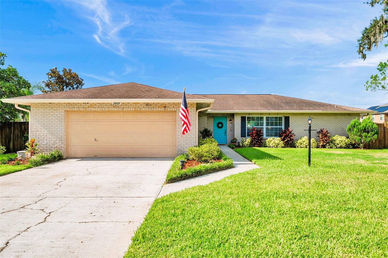 NEW ROOF to be installed prior to closing! WELCOME to this delightful ranch-style POOL home in the peaceful Springdell Estates, where tranquility meets convenience in perfect harmony. This charming three-bedroom, two bathroom residence sits on a generous homesite in an established 32-home neighborhood, offering the rare luxury of space without the burden of homeowner association or community development district fees. Step inside to discover a thoughtfully designed floorplan that maximizes both functionality and comfort. The welcoming foyer opens to a versatile living room that would serve beautifully as a quiet den or home office. The separate dining room provides elegant space for memorable gatherings, while the spacious kitchen serves as the heart of the home with its convenient breakfast bar, abundant counter space, and pantry closet. There's plenty of room to add a center island if you're feeling ambitious. The open-concept family room flows seamlessly from the kitchen and features sliding glass doors that showcase the stunning backyard oasis. The split bedroom layout ensures privacy, with the primary suite positioned on one side of the home and two additional bedrooms with a shared bathroom on the other. The primary suite impresses with its enormous walk-in closet and private bathroom, creating a true retreat. Car enthusiasts and hobbyists will appreciate the oversized garage, offering ample space for vehicles, workshop, and storage. This well-maintained home boasts numerous updates including double-pane windows, replumbing in 2015, updated air conditioning and ductwork, a new well pump in 2023, beautiful bamboo flooring, and refreshed bathrooms. The backyard transforms your daily routine into a vacation experience. The 26x14 screened lanai provides the perfect relaxing and entertaining space, complemented by an open sun deck and poolside gazebo. The custom pool with elegant brick pavers creates a resort-like atmosphere, while the shed with electrical service, irrigation system, and double gate add practical convenience. A brick parking pad accommodates boats or recreational vehicles. Located just minutes from shopping, dining, and major roadways, yet tucked away from the hustle and bustle, this home offers affordable living with low property taxes, no water bills, and no association fees. The upcoming NEW ROOF installation prior to closing ensures worry-free homeownership from day one.