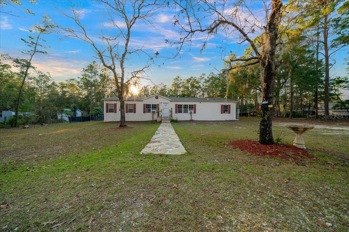 Welcome to this charming 3-bedroom, 2-bath pool home that is spread across 1,910 iving SqFt , located in the peaceful city of Dunnellon, Florida! Situated on a spacious 1-acre lot zoned agricultural, offering endless possibilities for country living. Whether youre dreaming of raising farm animals, growing your own garden or simply enjoying the wide-open space. Upon entry youll immediately feel at home in the inviting living space, complete with a LVP flooring throughout the main living areas and two living rooms that offer plenty of room for entertaining or creating separate spaces for your familys needs. The well-appointed kitchen offers plenty of counter space for meal prep and storage for all your kitchen essentials with a large pantry. Split floor plan with the primary suite on the one side with a oversized walk-in closet. Off the primary bedroom is a en-suite bathroom with a garden tub, double vanities and walk-in shower. On the opposite side of the home you’ll find two additional bedrooms with convenient access to the guest bathroom. Step outside into the fully fenced backyard and expansive deck,perfect for soaking up the Florida sunshine or hosting outdoor gatherings. Enjoy hot summer days in the refreshing above-ground pool, while the storage shed and 2-car carport equipped with electric provides ample space for all your tools, equipment and vehicles. Enjoy peace of mind with a brand-new well installed in 2024 & roof replaced in 2022. Don’t miss out—schedule your private showing today!