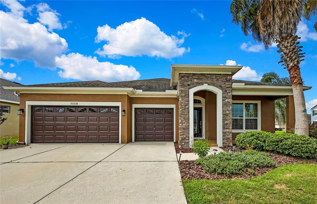 Photo of 31518 Bearded Oak Drive, Wesley Chapel, FL 33543 (MLS # TB8404033)