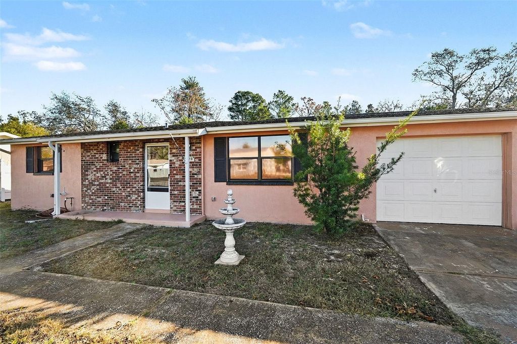 Photo of 9528 River Road, Spring Hill, FL 34608 (MLS # TB8469876)