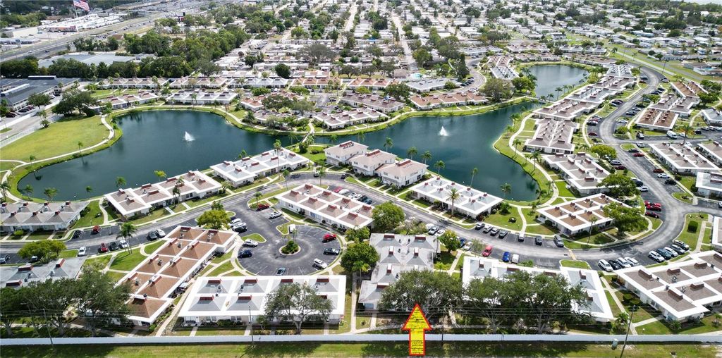 Photo of 4365 Tahitian Gardens Circle #E, Holiday, FL 34691 (MLS # TB8434737)