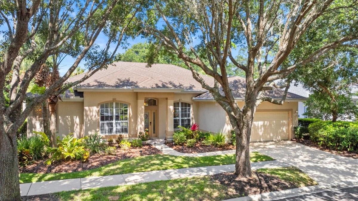 Welcome to a residence where every corner is designed with comfort and sophistication in mind, nestled within the luxurious Grand Haven community of Palm Coast. This stunning three-bedroom home, complete with an office and two bathrooms, offers a serene retreat with breathtaking views of the preserve and golf course frontage.
Upon entering, you are immediately embraced by an open great room floor plan, where engineered wood floors and tasteful tile provide a seamless transition between spaces. The home is bathed in natural light, thanks to the 8-foot stackable sliders and single French doors that lead to the inviting pool area, complete with a large covered lanai.
The recently remodeled kitchen is a chef's dream, showcasing exotic leather granite countertops and Whirlpool black stainless appliances. The walk-in pantry, equipped with wood shelving, adds both elegance and practicality to this culinary haven.
The luxurious owner's suite is a true sanctuary, featuring a spacious walk-in closet and sliders that lead directly to the pool area. The en-suite bathroom offers indulgence with a jetted tub and a walk-in shower.
Guests will appreciate the privacy offered by the split floor plan, where the secondary bedroom and bathroom provide a private retreat. The secondary bathroom also features a convenient pool area service door.
For added peace of mind, the home is equipped with a new security system and surveillance cameras, ensuring safety both inside and outside. This isn’t just a home—it’s a lifestyle of elegance, privacy, & resort-style living in one of Palm Coast’s most sought-after communities.