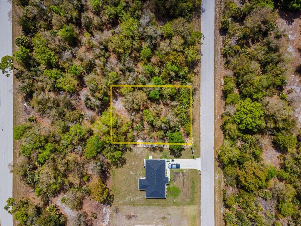Photo of 7084 Lippman Road, Port Charlotte, FL 33981 (MLS # A4686225)
