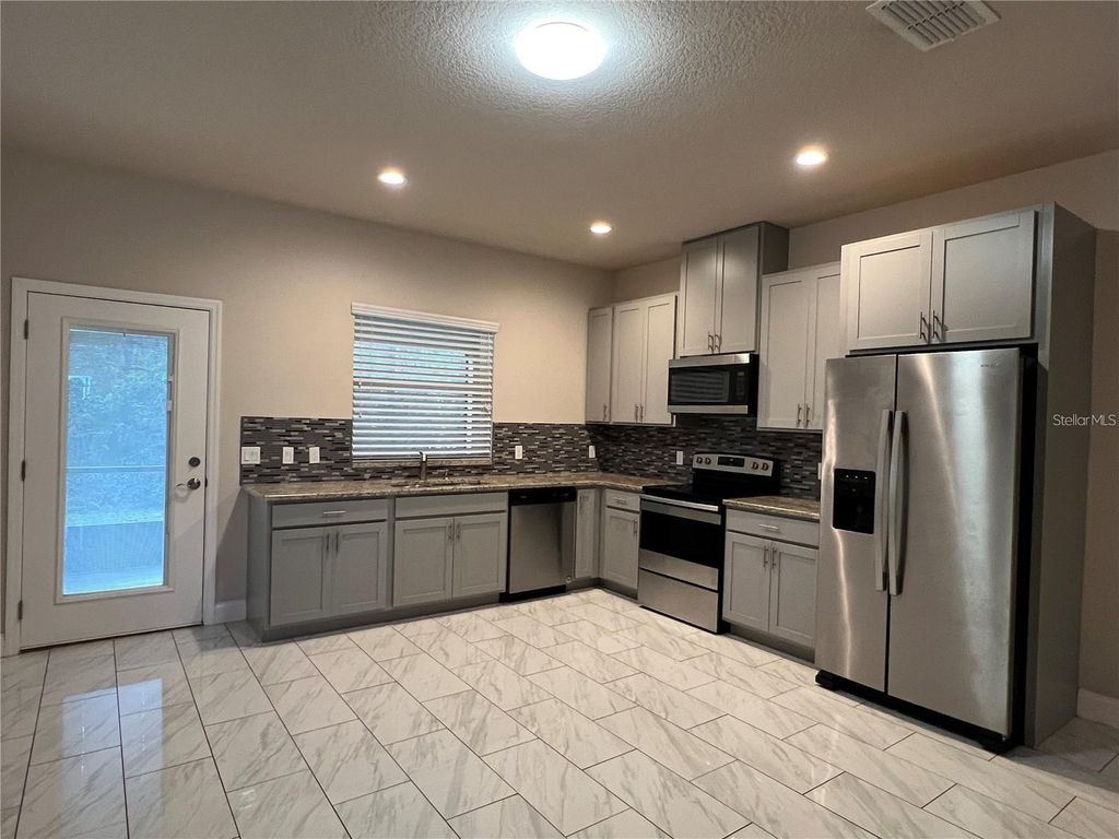 Photo of 11 Ullock Place #A, Palm Coast, FL 32164 (MLS # FC314719)