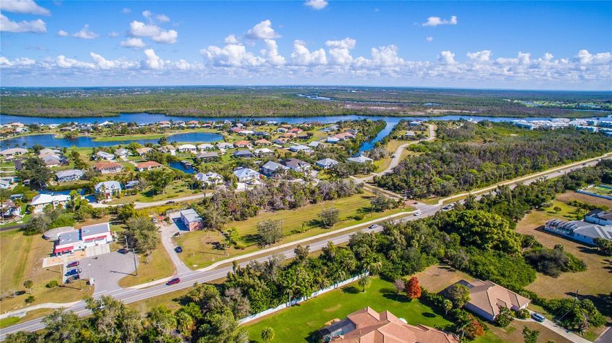 MAGNIFICENT LOT WITH DEEDED BOAT DOCK NEAR BOCA GRANDE. IN THE GATED COMMUNITY OF CORAL COVE LOCATED IN PLACIDA, FLORIDA. DEEDED BOAT DOCK 28 FT W/ELECTRIC & WATER WITH ACCESS THE ACROSS FROM THE LOT. AMBERJACK CREEK TO GULF OF AMERICA.  LOT IS 18,231 SQ. FT. AND HAS PUBLIC SEWER & WATER, CABLE, UNDERGROUND UTILITIES. PRIVATE ROAD, UPSCALE HOMES, ONLY 25 HOMESITES.  WOODED IN THE REAR OF THE LOT   $1295 YEARLY ASSOCIATION DUES COVER ALL THE HOA AND DOCK MAINTAINENCE. JUST MINUTES TO BOCA GRANDE, PUBLIX AND PLACIDA BOAT RAMP.
DON’T MISS WORLD CLASS BEACHES,BOATING AND FISHING! MARK YOUR CALENDAR FOR THE ANNUAL WORLD CLASS TARPON TOURNAMENT, GREAT RESTAURANTS LIKE RUM BAY, SOUTH BEACH BAR, PINK ELEGANT, FARLOWS ON THE WATER, LOCK N KEY, LIGHTHOUSE GRILL AND THE WAVERLY. COME EXPLORE HISTORIC ENGLEWOOD, WITH ITS FUNKY DOWNTOWN, MUSIC VENUES LIKE ENGLEWOODS ON DEARBORN, THE WHITE ELEPHANT, THE SANDBAR TIKI 
GASPARILLA MARINA AROUND THEW CORNER. 
THE ENGLEWOOD HOSPITAL, PUBLIC AND PRIVATE GOLF COURSES ARE A SHORT DRIVE AWAY.  COME ENJOY THE LUXURY WATERFRONT LIFESTYLE AT AFFORDABLE PRICES AND BE SURROUNDED BY THE GULFCOAST BEAUTY AND CLIMATE. NO TIME LIMIT TO BUILD.