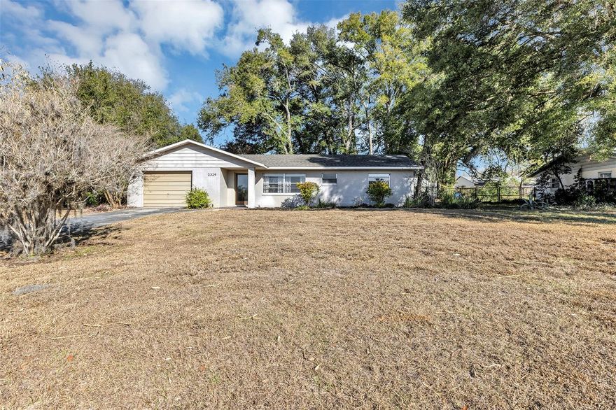 First Home?  Investor Home? Family Home?  Are you ready to add your personal decorative touches to this home on 1/3 acre, wooded backyard, quiet neighborhood and dead-end street? Let’s see all you get with this home that is priced to sell!  New Roof 2024, New HVAC 2016, New Water Heater 2015, 1 car garage, and Block construction (not wood frame). Plus, this home includes a fabulous 15 x 23 enclosed Porch! (Tax records do not include the square footage of the Back Porch) The Back Porch features large sliding windows, tile floor, French doors, and 2 outside access doors to the peaceful, wooded backyard. This backyard is ready for a fire pit, wood included! The open plan is bright with plenty of natural light throughout. The Kitchen/Dining combo along with a breakfast bar are perfect for dining and/or a quick lunch. The Primary Bedroom is split from the 2 Guest Bedrooms; and Primary Bedroom and Bedroom 2 include walk-in closets.  Call today to schedule your private showing and see all this home can offer you!  ***Buyers may qualify for “Special Lender Credit”!
