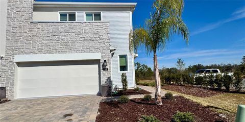Photo of 93 Nine Iron Drive, Davenport, FL 33896 (MLS # O6379503)