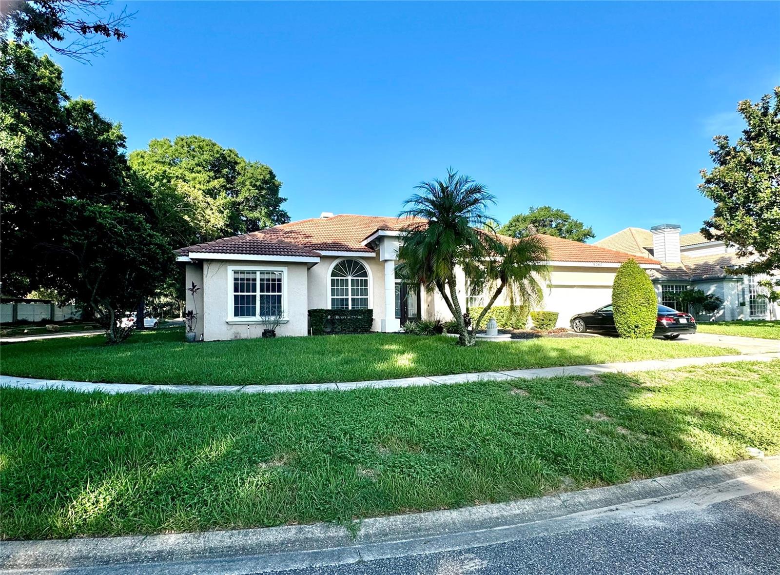 BAY HILL HOME for rent! LOCATION, LOCATION, LOCATION! Welcome to your dream home located in Arnold Palmer's Bay Hill Golf Club Community! Located in one of Orlando's hottest zip codes, with a 10 to 20-minute drive to all the theme parks, the airport, and downtown, and just over an hour from the beach, this home offers the perfect blend of luxury and unparalleled convenience. Walking distance to famous Restaurant Row, 10 minutes from Universal, Epic Universal, and Conference Centre, 15-20 minutes to Disney parks and Disney Springs, everything you need is right at your fingertips. Nestled on a tree-lined corner lot of a private cul-de-sac street, this renovated four individual Suite split floor plan home features four world-class luxury bathrooms individually connected to each bedroom. Modern kitchen featuring elegant quartz countertops, offering both style and functionality, perfect for cooking and entertaining. The master suite is a true retreat with a huge shower equipped with a luxurious rainhead. Open kitchen, family, living, formal dining, and other areas o/er cathedral 14' ceilings throughout with natural light. Additional features include upgraded Bosh appliances, fresh paint inside, modern ceiling fans, and more. Beyond the double French doors, an outdoor summer kitchen, large TV, and pool are an entertainer's paradise, ideal for gatherings and outdoor enjoyment. Don't miss this rare opportunity to enjoy a luxury home in one of the most desirable Orlando locations.