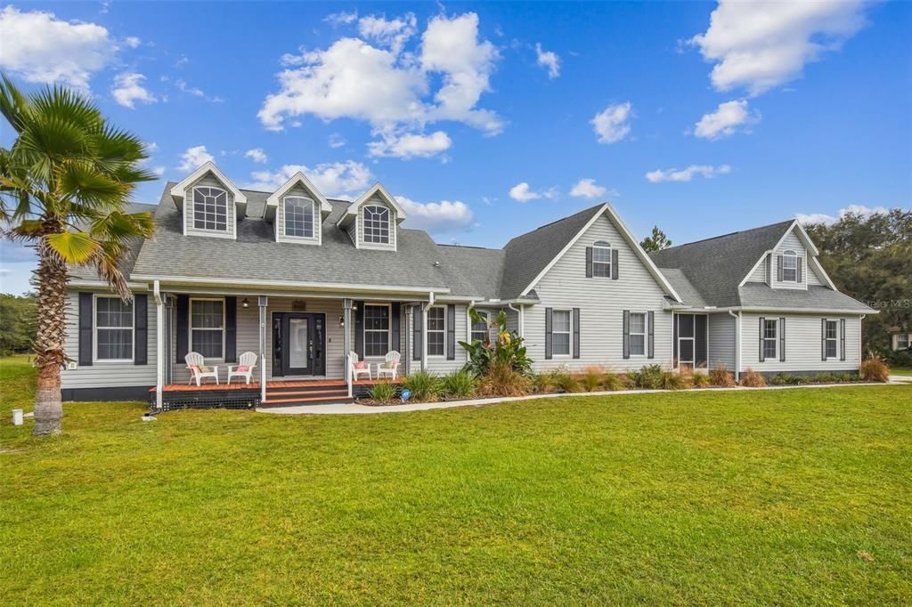 Photo of 8640 WOODLEAF BOULEVARD, WESLEY CHAPEL, FL 33544 (MLS # T3413047)
