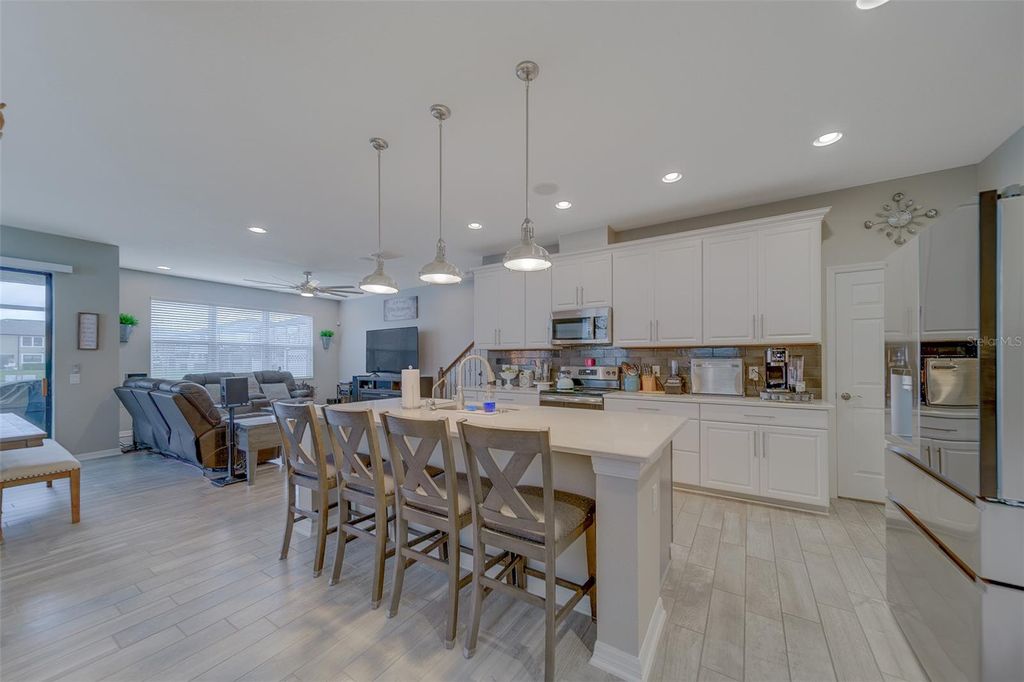 Photo of 11437 Crowned Sparrow Lane, Tampa, FL 33626 (MLS # TB8465165)