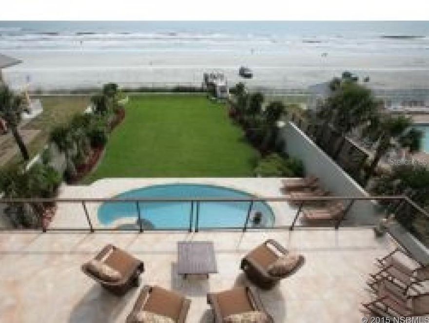 Gated DIRECT Oceanfront Luxury Home. This unique and Quality built home is a Masterpiece. With Approximately 4900 Sq Ft of Living area; Gracious rooms that provide wonderful gatherng & entertainment areas all providing dramatic views of the Atlantic Ocean. Love to Entertain? For the Summer Grilling and Chilling relax Ocean side around the (heated) pool and spa with summer kitchen. Enter into the Main Level Living completely equipments for all your entertaining and Guest with full sized gourmet kitchen, a spacious Office/den/bedroom for Guest and large Living/Dining combo area for the sport enthusiast. For the more dramatic and elegant entertaining the 2nd level boast the ultimate in luxury entertainment. Balconies to watch the waves roll in , a built in Fish Tank, Double sided fireplace, a Gourmet Kitchen any chef would be honored to create meals. The 3rd level is your private sanctuary. Quality construction with concrete construction on all 3 levels, 27-26'ft pilings/seawall. Metal Standing Seam Roof, porcelain and marble floors, Brazilian and cherry wood floors, central vac system, sound system Renai water heater, Electric Gate Entrance, Etched Glass Stairway, door and some windows, Summer kitchen with built in bar,manicured flowering yard, 2 full kitchens, 3 dishwashers, 3 disposals, 2 microwaves, 3 refrigerators, 2 washer and dyers zoned air conditions 3 car garage, custom beach private walk over and Elevator.SYNOPSIS: 1st floor: Guest/Pool level with Bed or Office/ Full Kitchen/ Dining/ Full Bath out to the Pool/Summer Kitchen. Arrive to 2nd Floor in elegant elevator to Gorgeous Open Area, Salt Water Fish Tank, Dining room with Custom Full size Wet Bar and Access to balcony, Guest Master Suite with Ensuite. Oversized Balcony, Gourmet Kitchen and Double Sided Interior/Exterior Fireplace. 3rd Floor Living offers a Full size kitchenette, Sitting/Library area, 3 Master Suite/ensuites and Laundry. ;Water: City